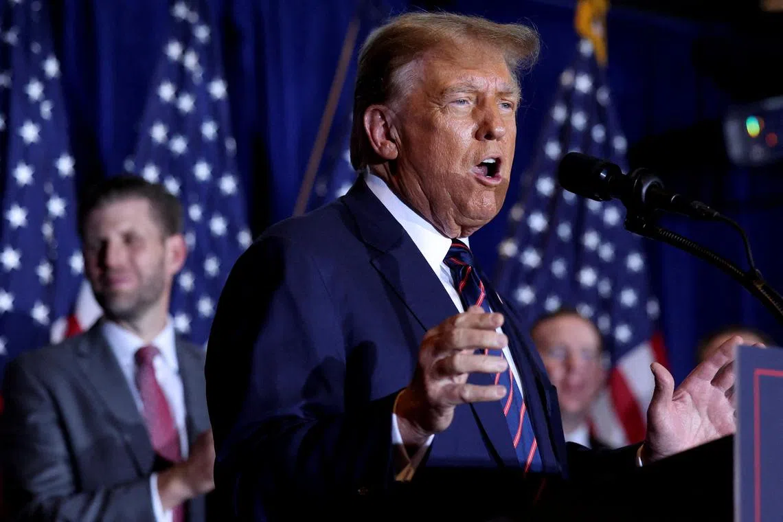 FILE PHOTO: Republican presidential candidate and former U.S. President Donald Trump speaks during his New Hampshire presidential primary election night watch party, in Nashua, New Hampshire, U.S., January 23, 2024. REUTERS/Mike Segar/File Photo