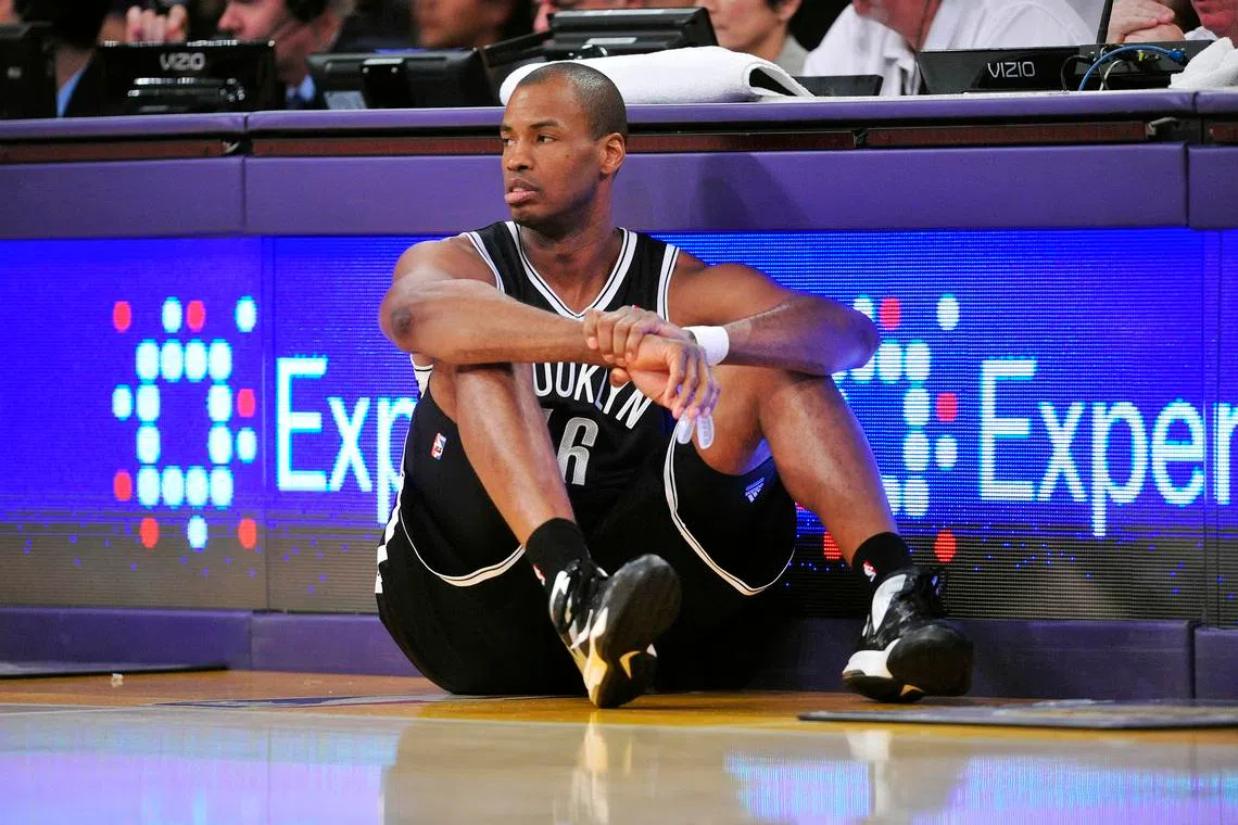 NBA player Jason Collins, pictured during a match for the Brooklyn Nets, has died at the age of 47 after battling cancer.