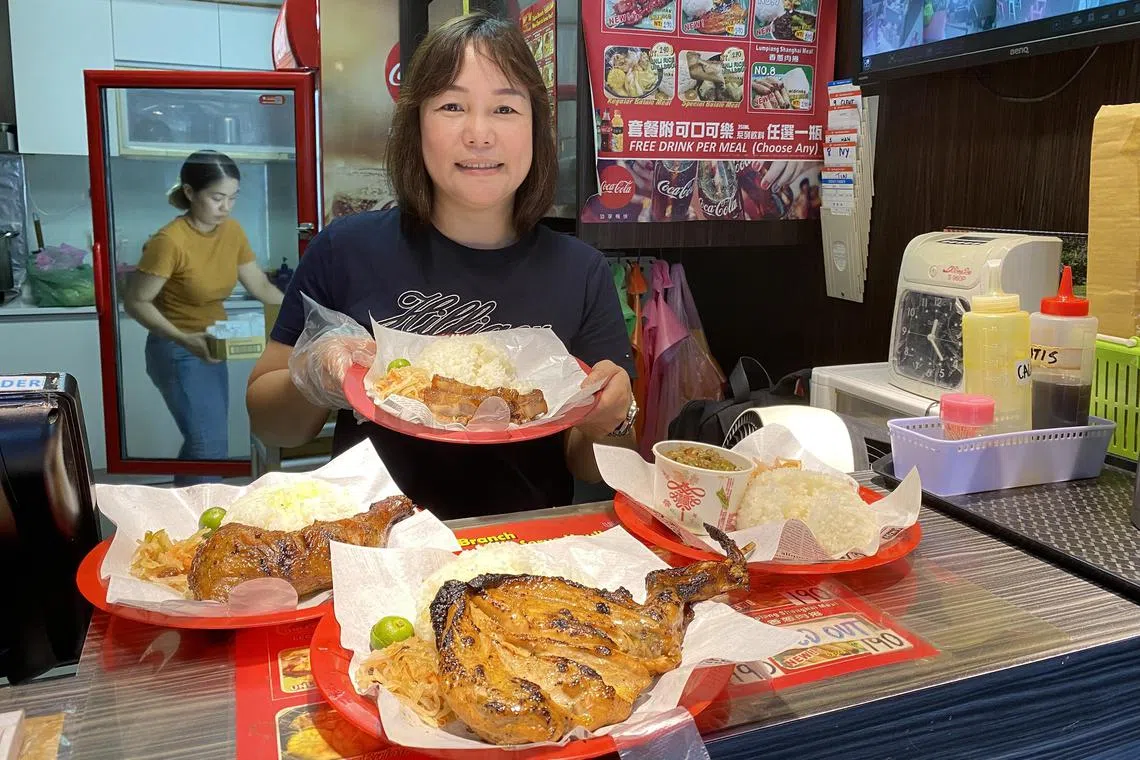 wyyfilipino - Ms Grace Saparco cooks authentic Filipino dishes at her eatery in Taipei's "Little Manila".
ST PHOTO: YIP WAI YEE