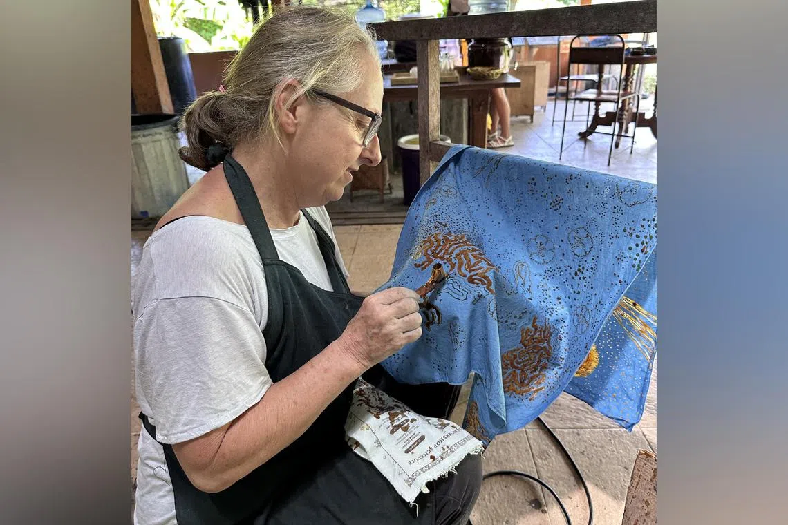 British artist Alison Wilson created 12 batik pieces over the last year in an effort to push herself artistically.