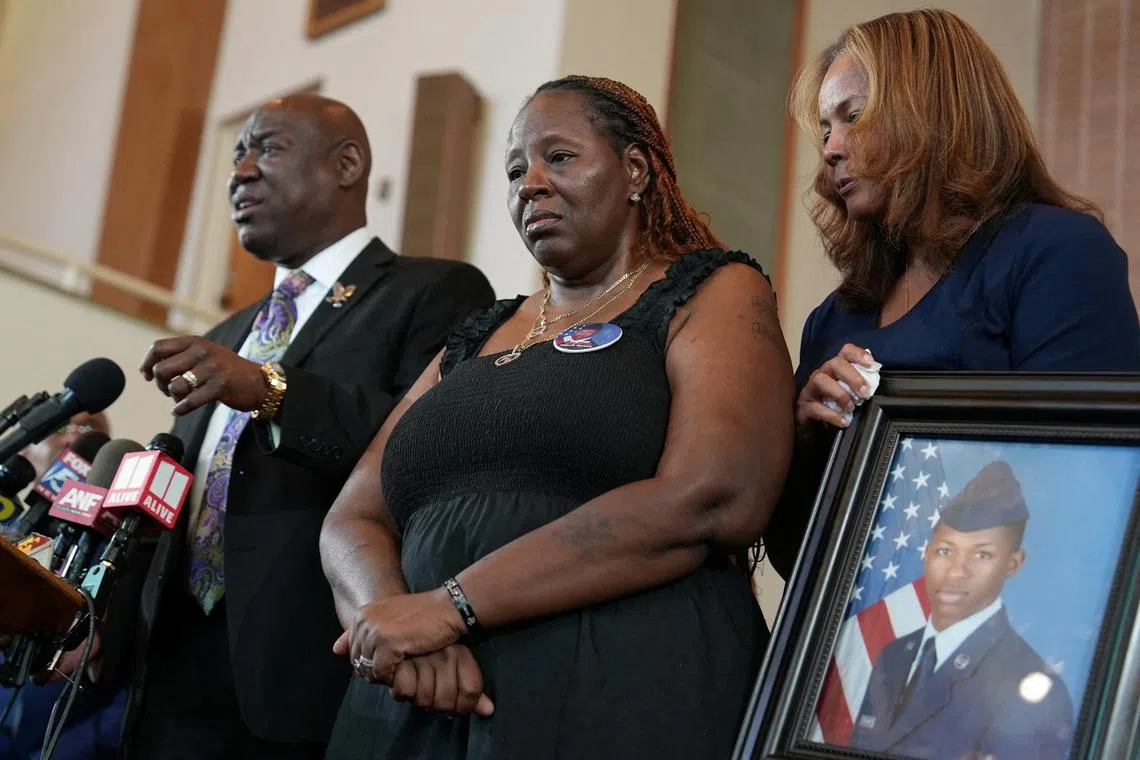 FILE PHOTO: Chantemekki Fortson, mother of U.S. Airman Roger Fortson, listens as Civil Rights Attorney Ben Crump speaks following the firing of Okaloosa County Sheriff Deputy Eddie Duran during a press conference at Mt. Zion Second Baptist Church, in Atlanta, Georgia, U.S., June 3, 2024. Okaloosa County Sheriff Deputy Eddie Duran shot and killed Senior Airman Roger Fortson inside Fortstons home in Florida. REUTERS/Alyssa Pointer/File Photo