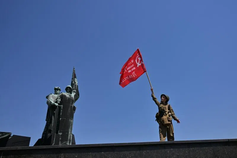 People visiting the Leninist Komsomol Park during the Victory Day celebrations in Donetsk, Russian-controlled Ukraine, on May 9, 2026.
