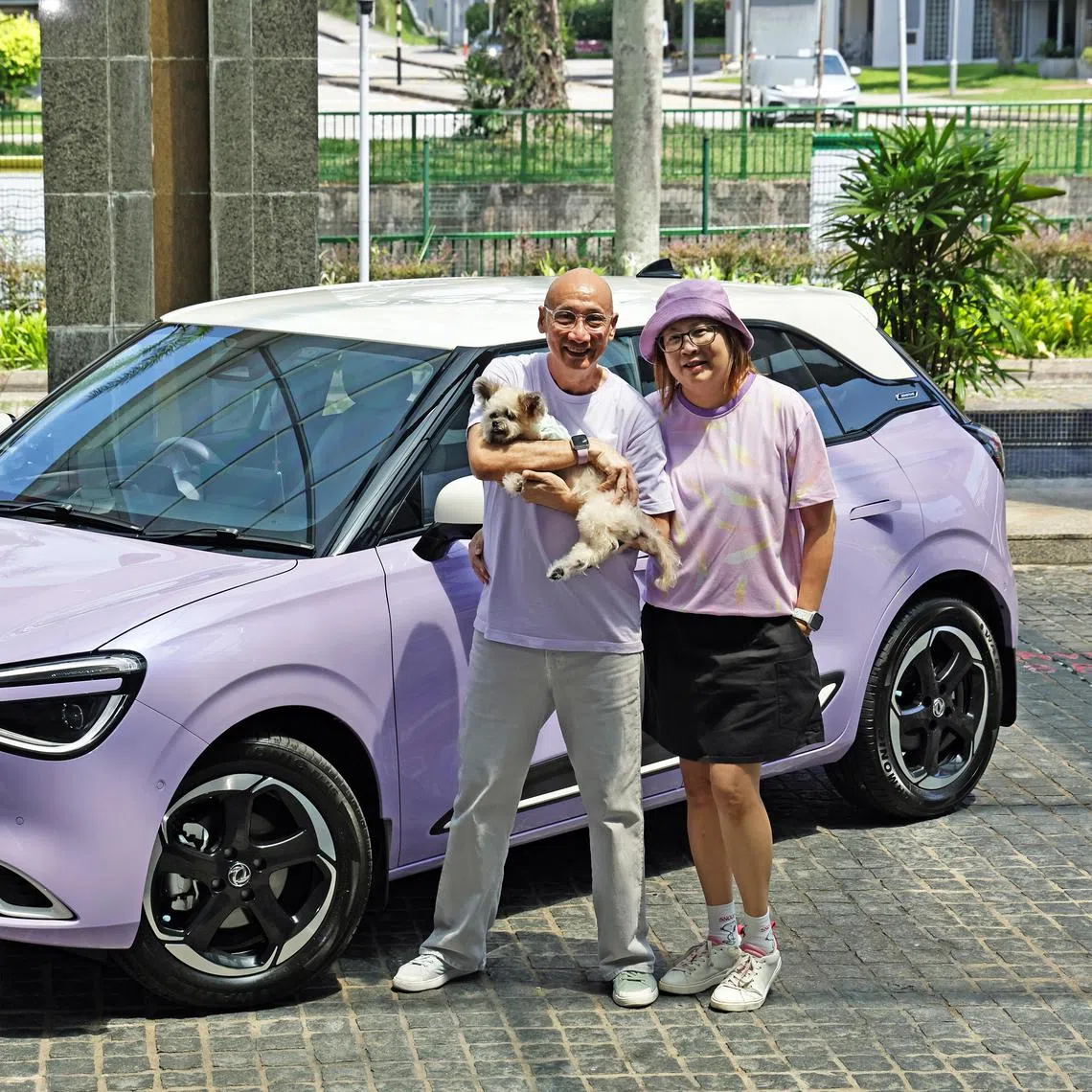 ST20250802_202514400111  Kelvin Chng

ycmycar22

1. Profile shot of Mr Tam, his wife and dog with the car.

2. Photo of boot
3. Photo of a custom-made bear they made with the nickname of the car.

Story Background


Me and My Car: Until early 2025, Mr Andrew Tam had never owned an electric vehicle (EV) ? or a car in any colour other than white. But that changed in January when the assistant director at the Singapore Institute of Technology?s alumni office bought his first EV: a purple Dongfeng Box. 