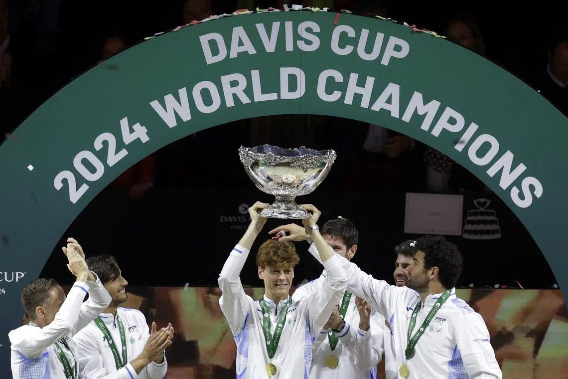 Tennis - Davis Cup Finals - Final - Italy v Netherlands - Palacio de Deportes Jose Maria Martin Carpena Arena, Malaga, Spain - November 24, 2024   Italy's Jannik Sinner celebrates with the trophy after winning the Davis Cup Finals REUTERS/Jon Nazca/ File Photo