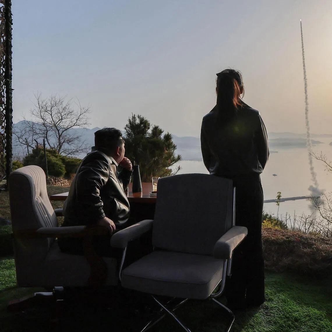 North Korean leader Kim Jong Un and his daughter inspecting the test-fire of a ballistic missile at an undisclosed location in North Korea on April 19.