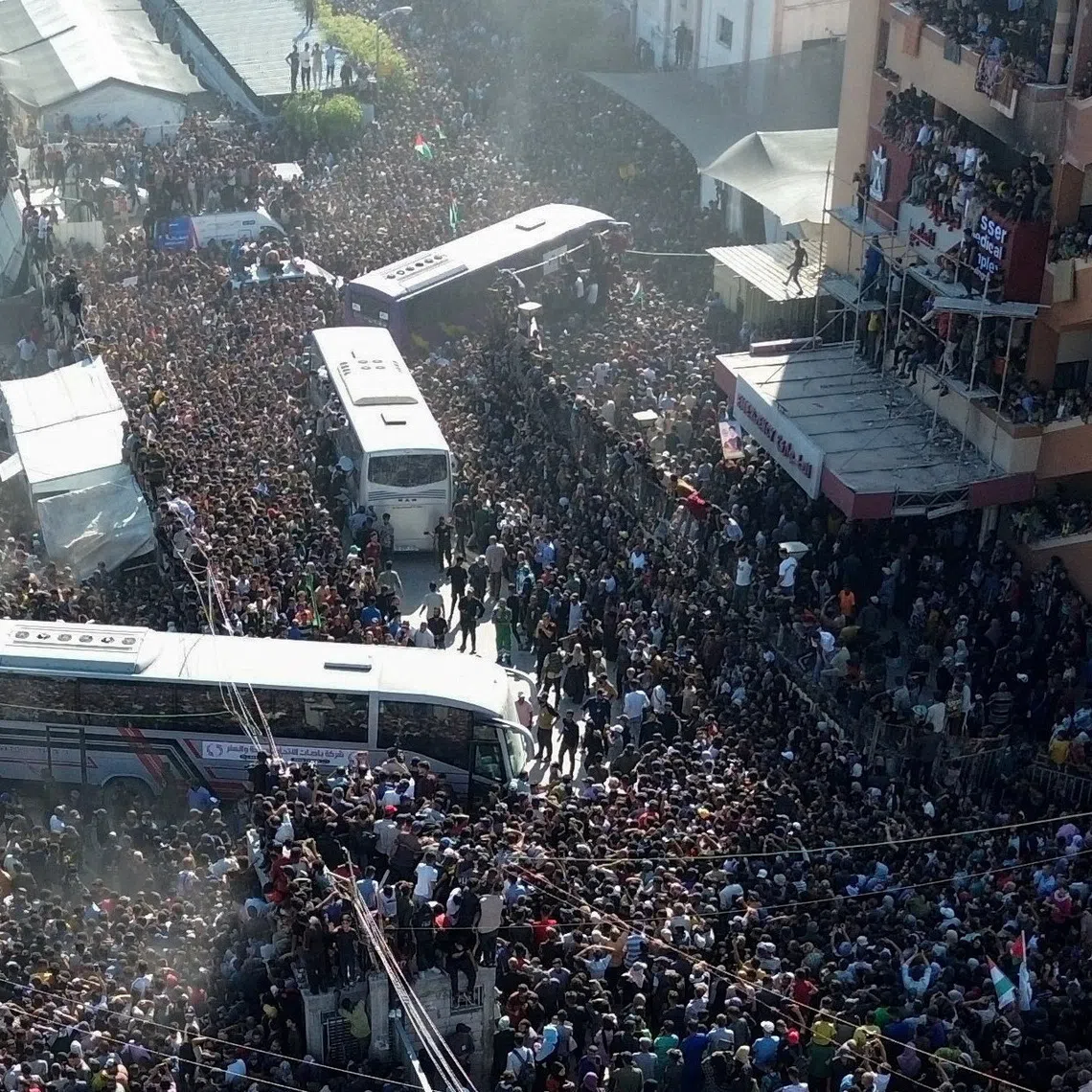 A drone view shows people gathering at Nasser hospital as they welcome freed Palestinian prisoners released by Israel as part of a hostages-prisoners swap and a ceasefire deal between Hamas and Israel, in Khan Younis in the southern Gaza Strip, October 13, 2025. REUTERS/Stringer     TPX IMAGES OF THE DAY