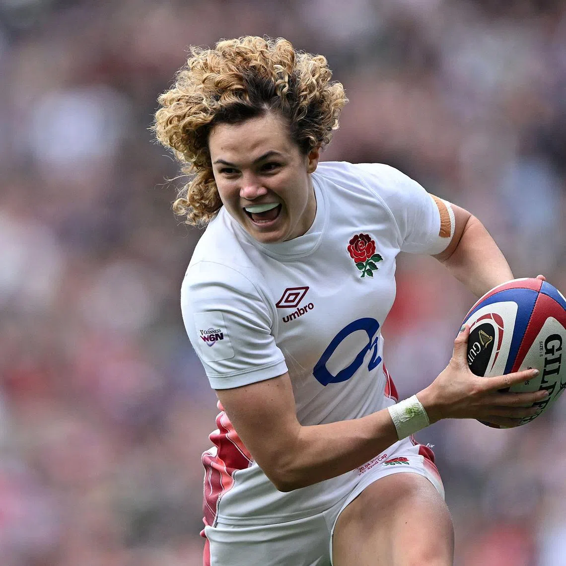 England full-back Ellie Kildunne celebrates after scoring a try during the Six Nations union match against Ireland at Twickenham on April 20, 2024.