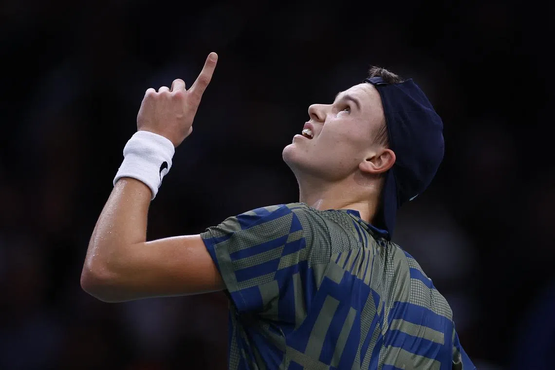 Denmark's Holger Rune reacting during his Paris Masters final win against Serbia's Novak Djokovic.