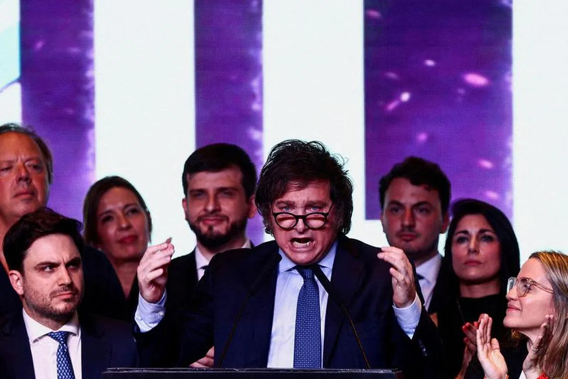FILE PHOTO: Argentina's presidential candidate Javier Milei addresses supporters as he reacts to the results of the presidential election, in Buenos Aires, Argentina October 22, 2023. REUTERS/Matias Baglietto