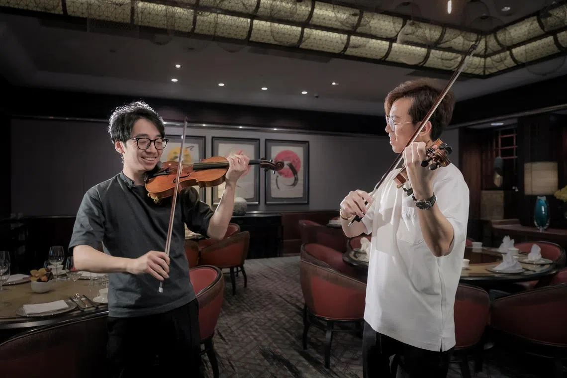 TwoSet Violin are a popular Australian classical music violin duo comprising violinists Brett Yang (left) and Eddy Chen (right).