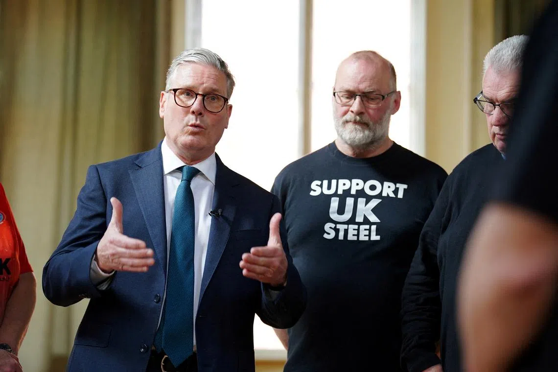 FILE PHOTO: Prime Minister Keir Starmer speaks during a visit to meet British Steel workers in Appleby Village Hall near Scunthorpe, Lincolnshire, Britain April 12, 2025. Peter Byrne/Pool via REUTERS/File Photo
