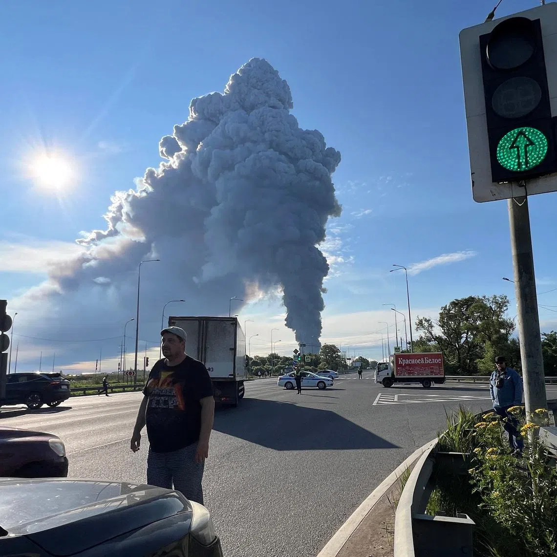 Smoke billows from the burning Wildberries warehouse following a Ukrainian drone attack, according to local authorities, in the course of the Russia-Ukraine conflict, in Saint Petersburg, Russia July 24, 2026. Picture taken with a mobile phone. REUTERS/Stringer