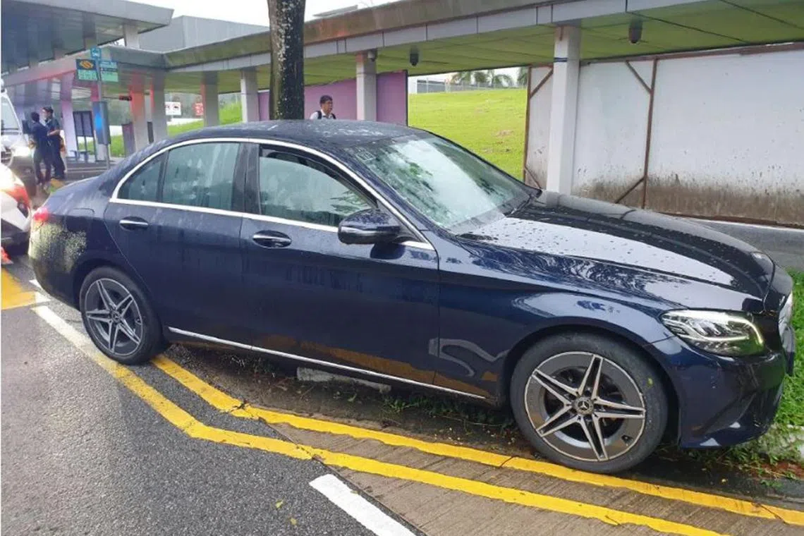 slcrash14 - A car that mounted a kerb near a bus stop in front of Sixth Avenue MRT station on Dec 1, 2023.

credit: court documents