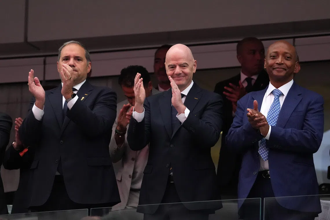 Jun 28, 2026; Inglewood, California, USA; CONCACAF President Victor Montagliani (left), FIFA President Gianni Infantino (center) and CAF President Patrice Motsepe attend a Round of 32 match between South Africa and Canada in the 2026 FIFA World Cup at Los Angeles Stadium. Mandatory Credit: Kirby Lee-Imagn Images