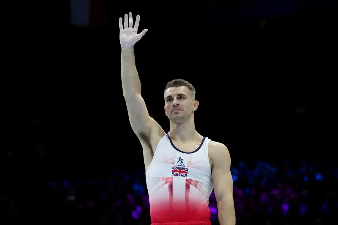 FILE PHOTO: Gymnastics - 2023 World Artistic Gymnastics Championships - Sportpaleis, Antwerp, Belgium - October 7, 2023 Britain's Max Whitlock reacts after his routine on the pommel horse during the men's apparatus finals REUTERS/Yves Herman/File Photo