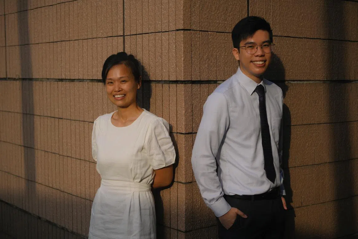 Terence Tian, 29 and Celeste Ling, 41, recipients of the SIM Chairman's Award for Resilience, pictured before the awards ceremony on Aug 17, 2023.