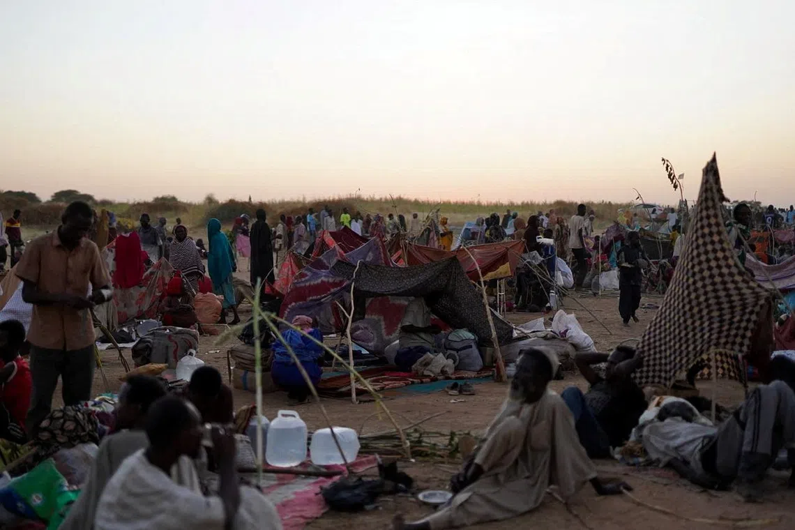 A general view of people sitting at a camp for displaced families who fled from al-Fashir to Tawila, North Darfur, Sudan, October 27, 2025. REUTERS/Mohammed Jamal