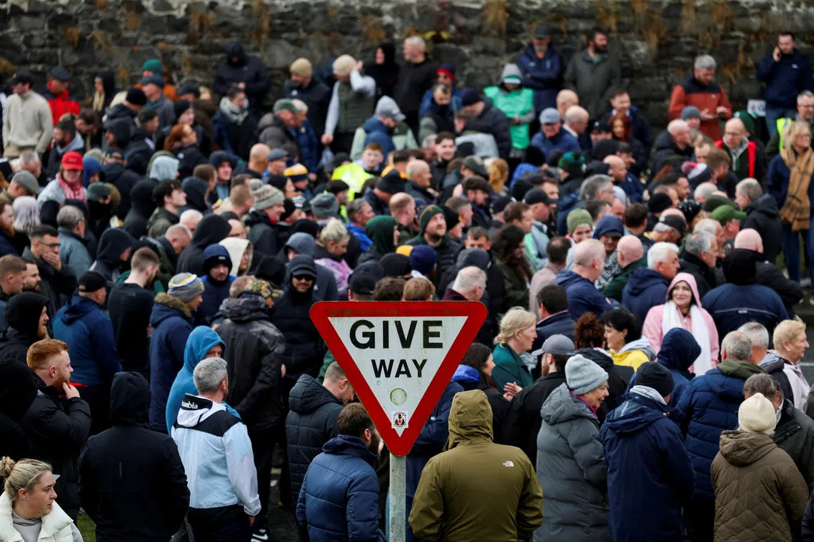 People protest on the Garvaghy Road, a Catholic enclave in the largely Protestant town of Portadown, against the Protestant Orange Order's annual Drumcree parade, in Northern Ireland, September 27, 2026. REUTERS/Cathal McNaughton
