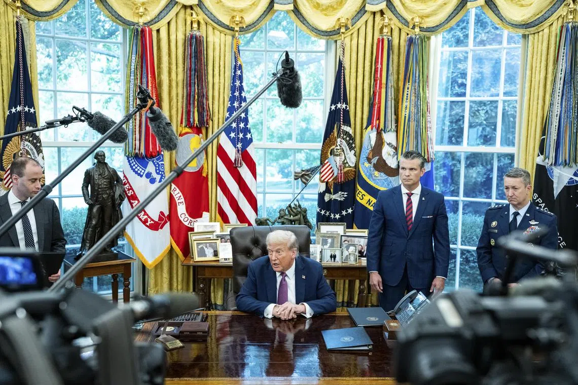 US President Donald Trump in the Oval Office with (from right) General Dan Caine, Chairman of the Joint Chiefs of Staff, and Secretary of Defence Pete Hegseth on Sept 5.