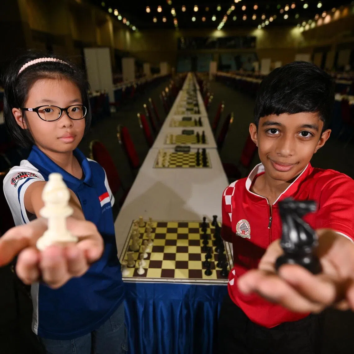 Zhang Yunyi (left) and Ashwath Kaushik pictured during the 24th ASEAN+ Age Group Chess Championships at Our Tampines Hub on Aug 15.