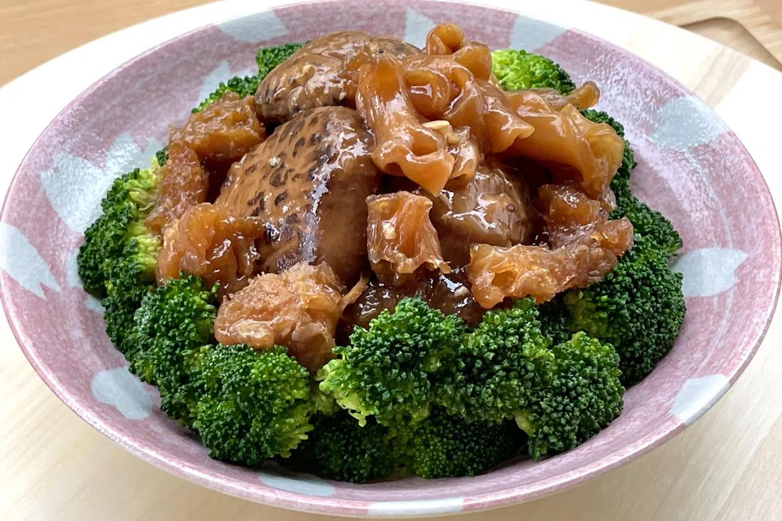 Braised mushroom with two types of fish maw and pork tendon.