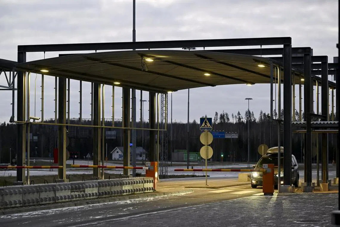 FILE PHOTO: A car is seen at the border between Russia and Finland at the Nuijamaa border checkpoint in Lappeenranta, Finland, November 16, 2023. Lehtikuva/Vesa Moilanen via REUTERS/File Photo