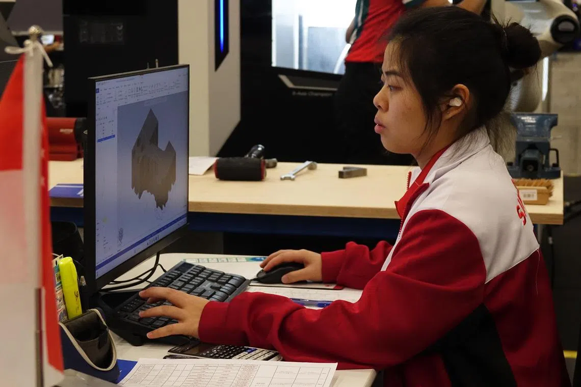 etfemale15 - Ms Shanice Wong focusing during the CNC milling event at the WorldSkills Lyon 2024 competition in France.

Credit: WorldSkills Singapore