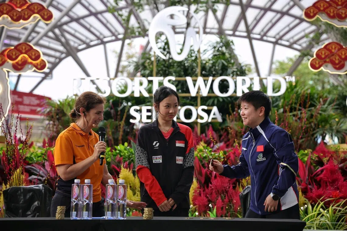 (From left) World Table Tennis match officials manager Tina Crotta, Ser Lin Qian of Singapore and Sun Yingsha of China at the draw for Singapore Smash at Resorts World Sentosa on Feb 20.