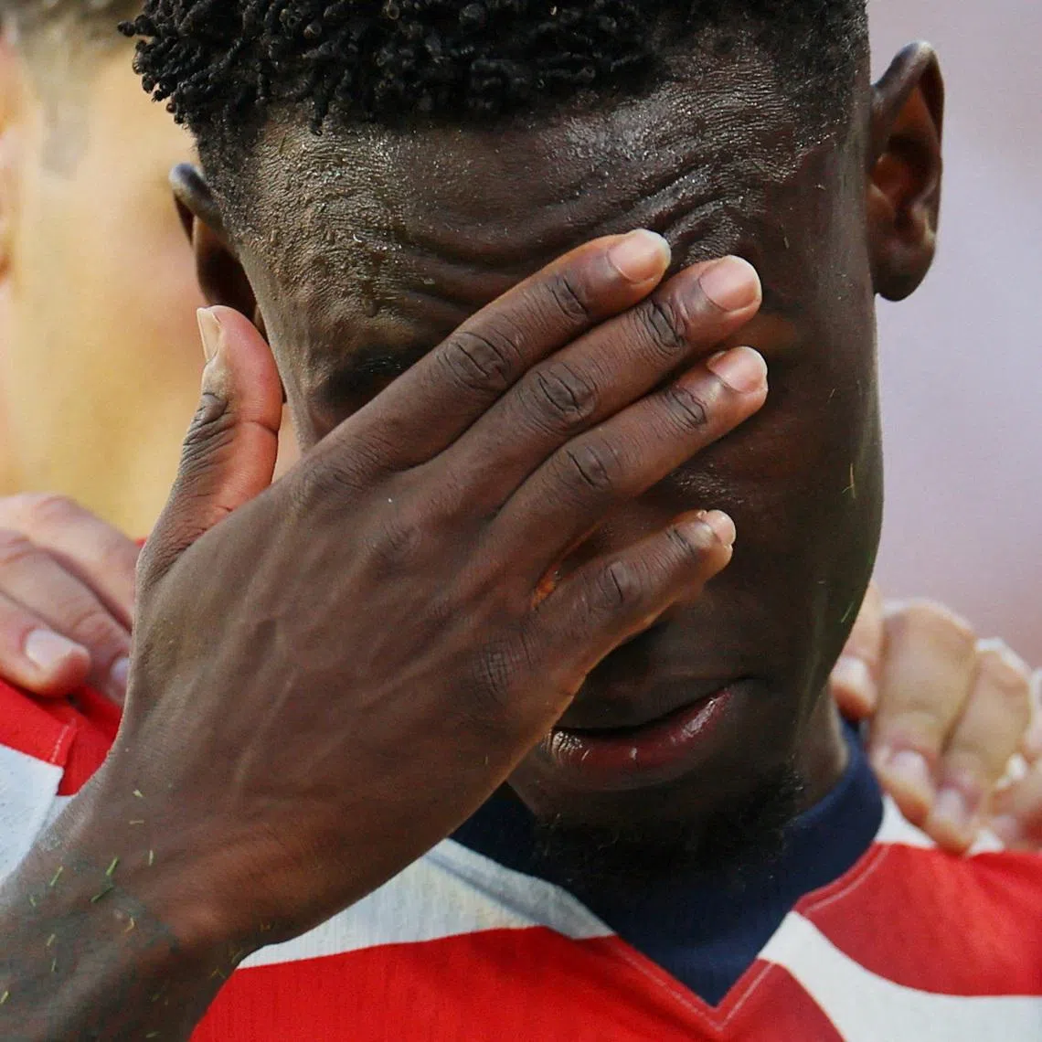 Soccer Football - FIFA World Cup 2026 - Round of 32 - United States v Bosnia and Herzegovina - San Francisco Bay Area Stadium, Santa Clara, California, U.S. - July 1, 2026 Folarin Balogun of the U.S. reacts after receiving a red card REUTERS/Carlos Barria