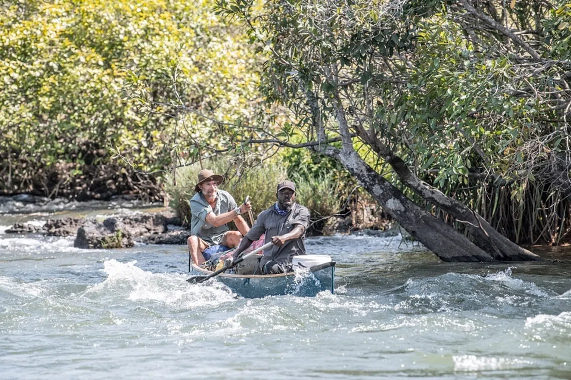 As part of the Great Spine of Africa expeditions, conservationist Steve Boyes (right, seen here with local guide Abraao Tony Luhoke) is trying to better understand and protect the continent’s crucial waterways.