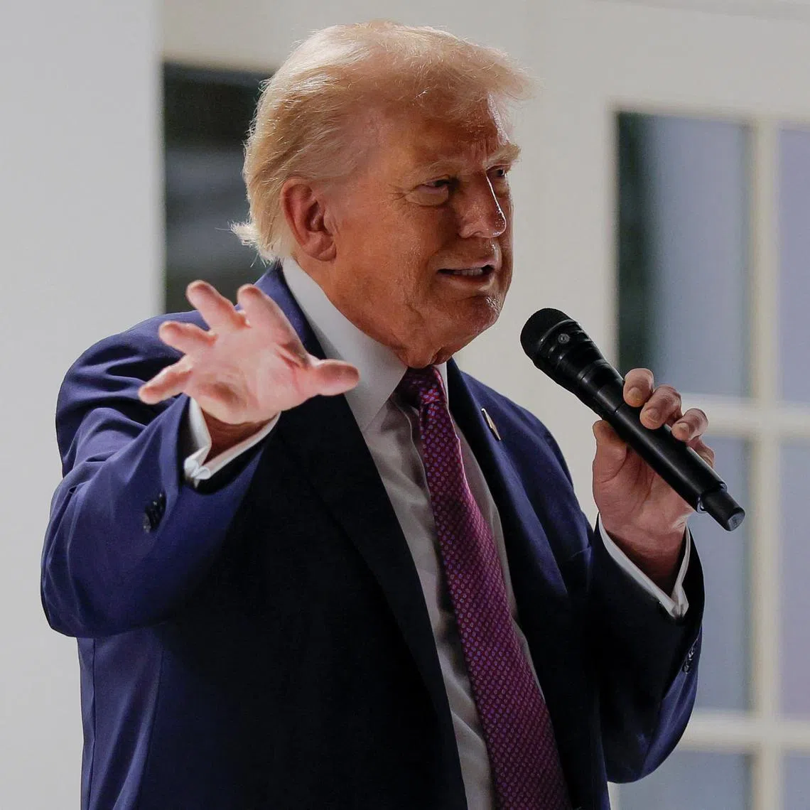 FILE PHOTO: U.S. President Donald Trump speaks during a dinner for lawmakers on the newly renovated Rose Garden patio, at the White House in Washington, D.C., U.S., September 5, 2025.  REUTERS/Brian Snyder/File Photo