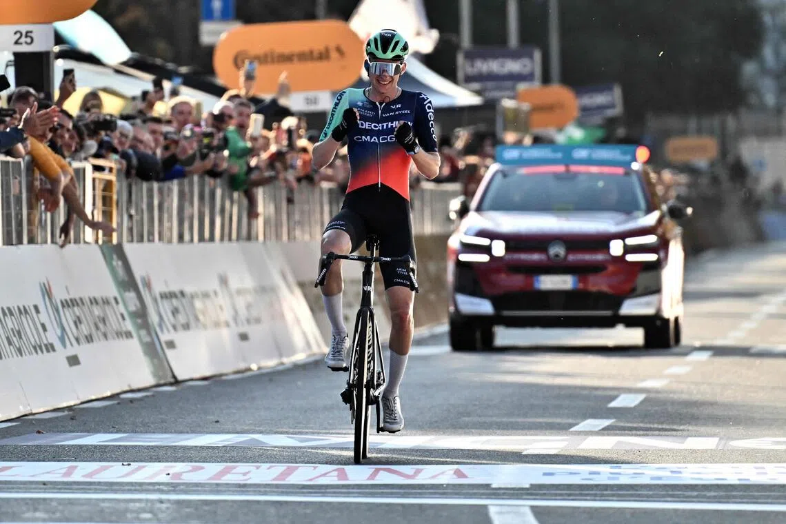 Paul Seixas celebrating after winning the 120th edition of the Giro di Lombardia between Bergamo and Como on Oct 10.