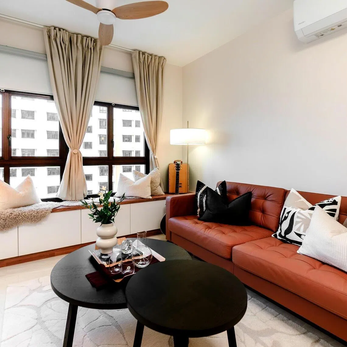 The living room of this MacPherson Weave BTO flat is ideal for the family of five's jamming and movie nights. 