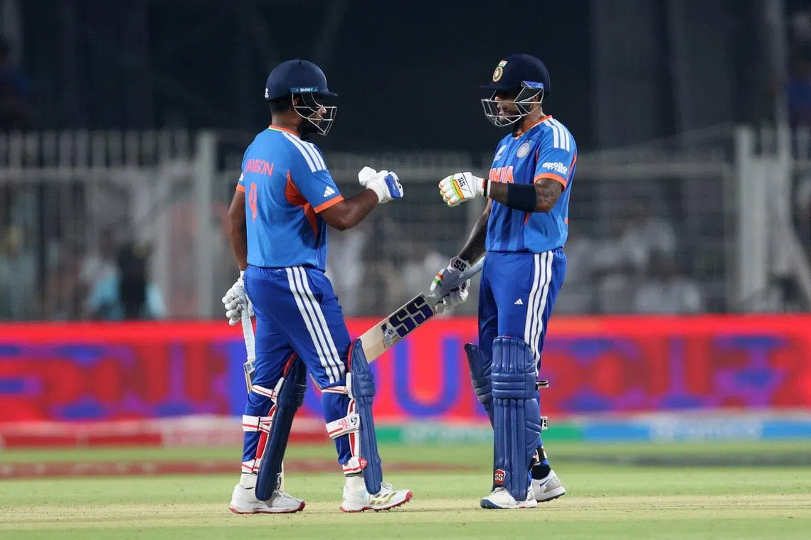 Cricket - ICC Men's T20 World Cup 2026 - Super 8 - India v West Indies - Eden Gardens, Kolkata, India - March 1, 2026 India's Suryakumar Yadav and Sanju Samson talk between overs. REUTERS/Sahiba Chawdhary
