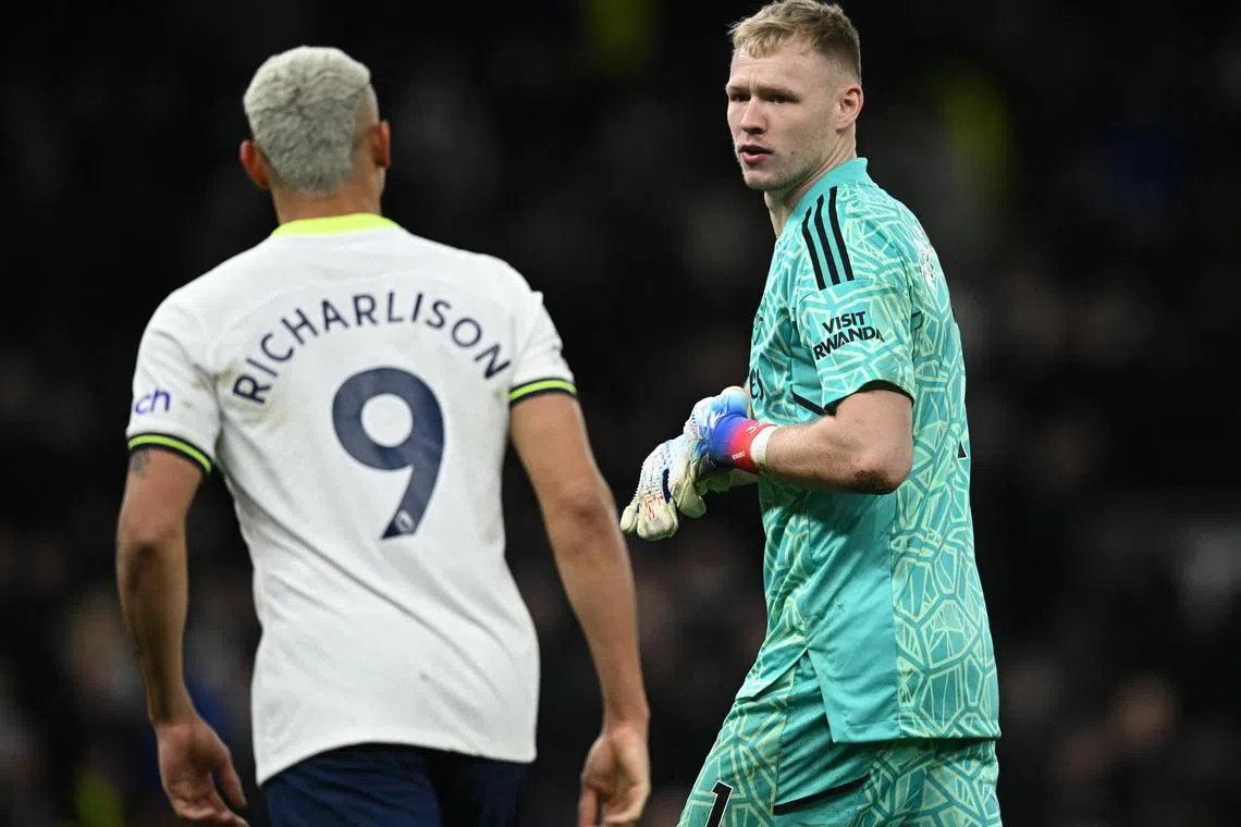 Tottenham Hotspur's Richarlison clashes with Arsenal's Aaron Ramsdale after the match.