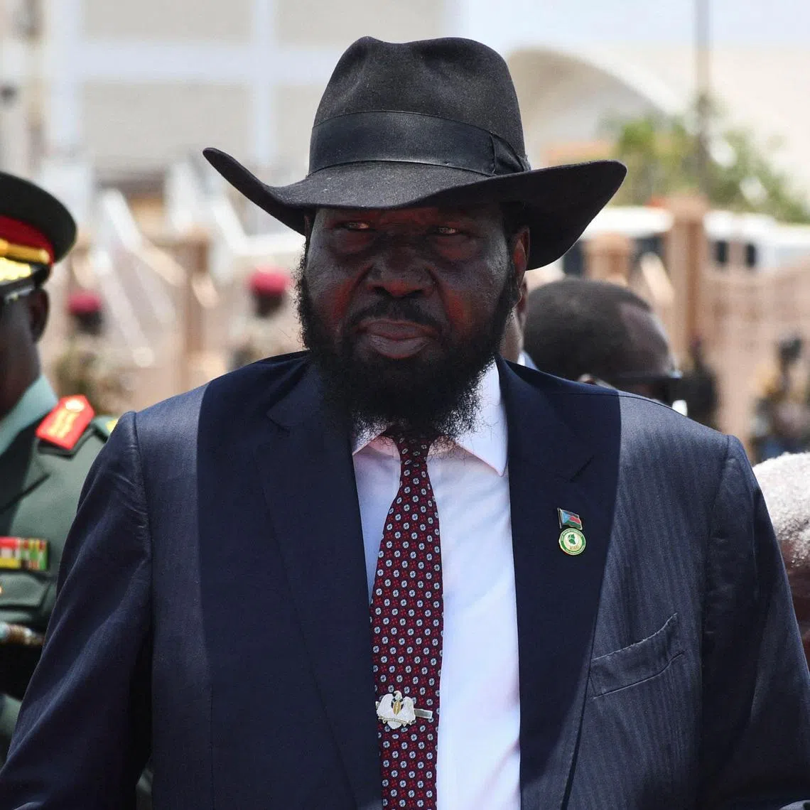 FILE PHOTO: South Sudan President Salva Kiir prepares to welcome Uganda's President Yoweri Museveni at the Juba International Airport in Juba, South Sudan April 3, 2025. REUTERS/Samir Bol/ File Photo