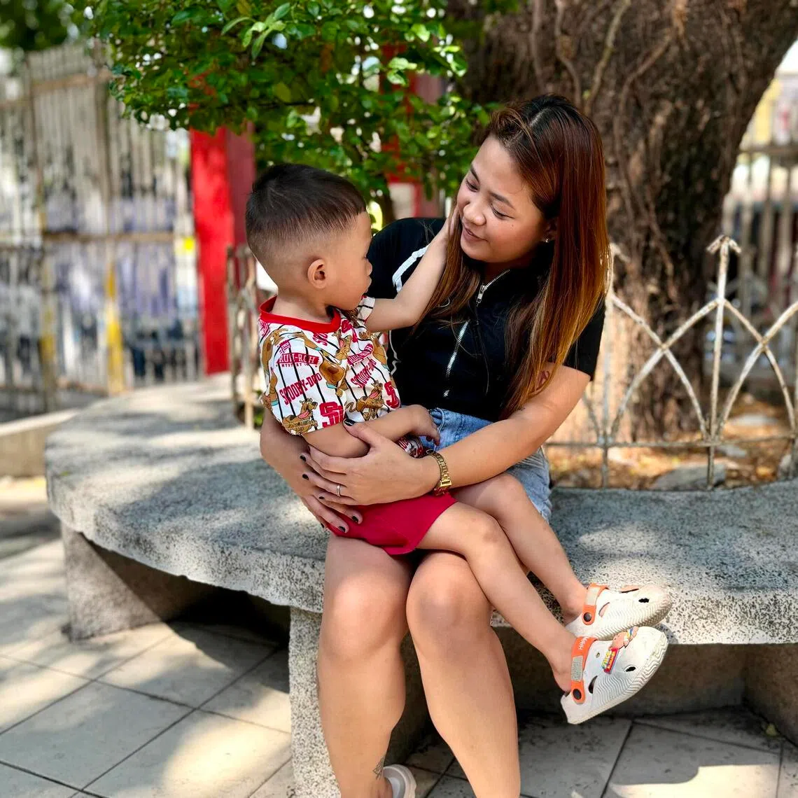 Sean Cabanban with his mother Erika on May 22. During a community check-up by local health workers in 2025, he was diagnosed with severe stunting.