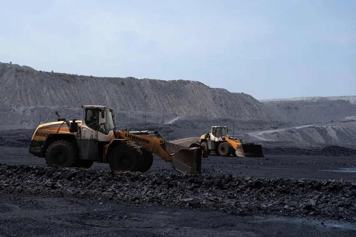 A loader at the coal mine operated by South Eastern Coalfields Ltd., in Gevra, Chhattisgarh, India, on Wednesday, May 10, 2023. India has to keep its power grid standing to cope with brutal temperatures, digging up expanding quantities of the dirtiest fossil fuel. Photographer: Anindito Mukherjee/Bloomberg