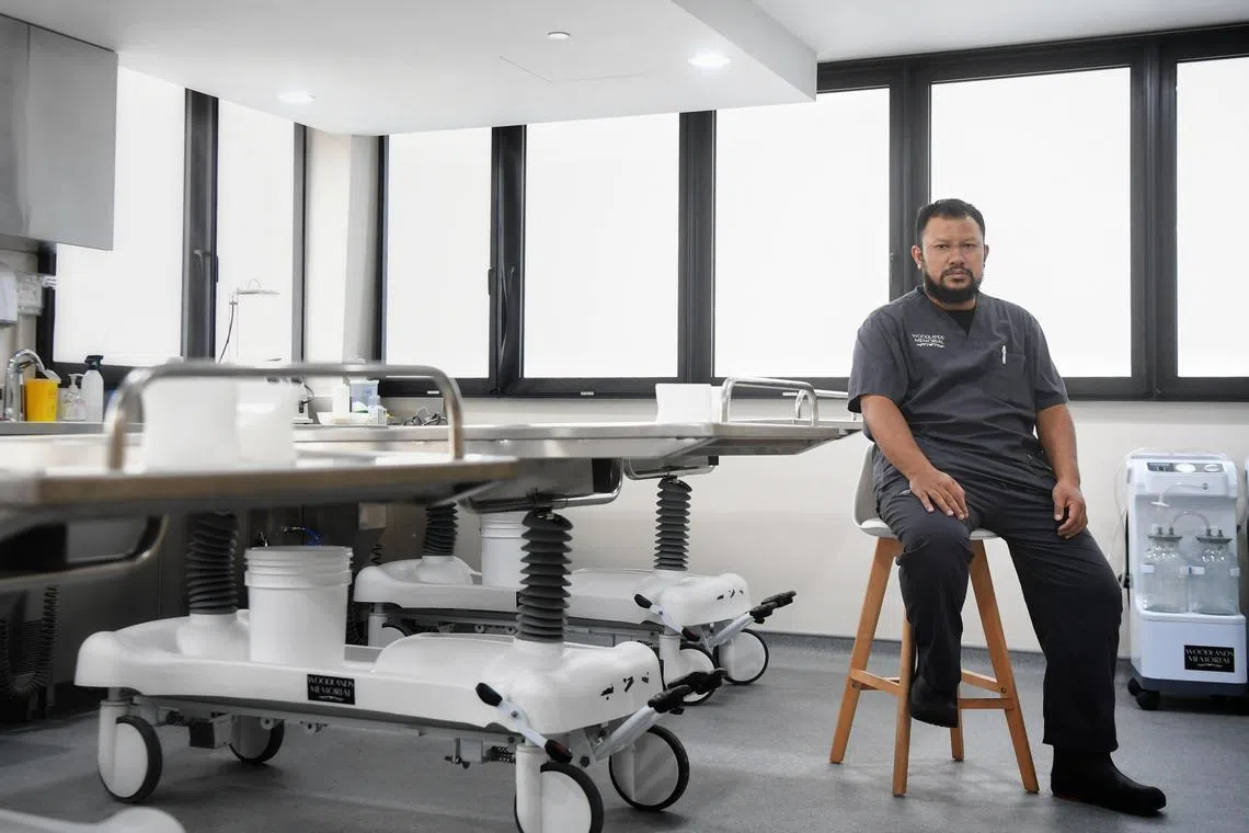 sfraja: Profile photo of Raja Ashraff, a Muslim embalmer who helps deceased of all faiths at Woodlands Memorial.  A look at his interesting job and how the 37 year old former banker from HSBC chose to be in the funeral sector instead. (ST PHOTO: AZMI ATHNI)