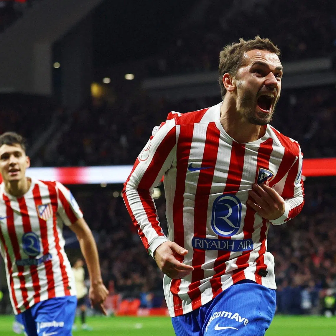 Soccer Football - Copa del Rey - Semi Final - First Leg - Atletico Madrid v FC Barcelona - Riyadh Air Metropolitano, Madrid, Spain - February 12, 2026 Atletico Madrid's Antoine Griezmann celebrates scoring their second goal REUTERS/Albert Gea