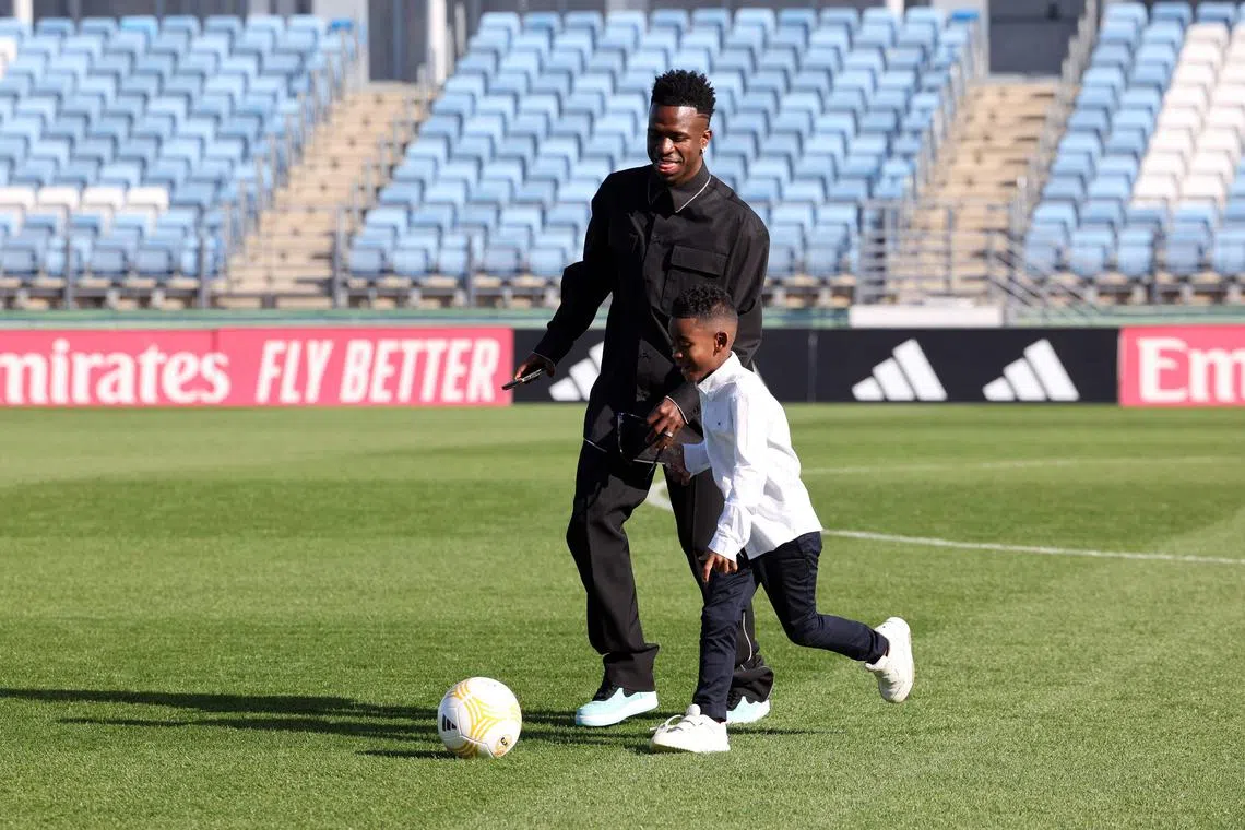 Vinicius Jr enjoys a kickabout with his younger brother Bernardo, after being appointed a Unesco goodwill ambassador for education for disadvantaged young people.