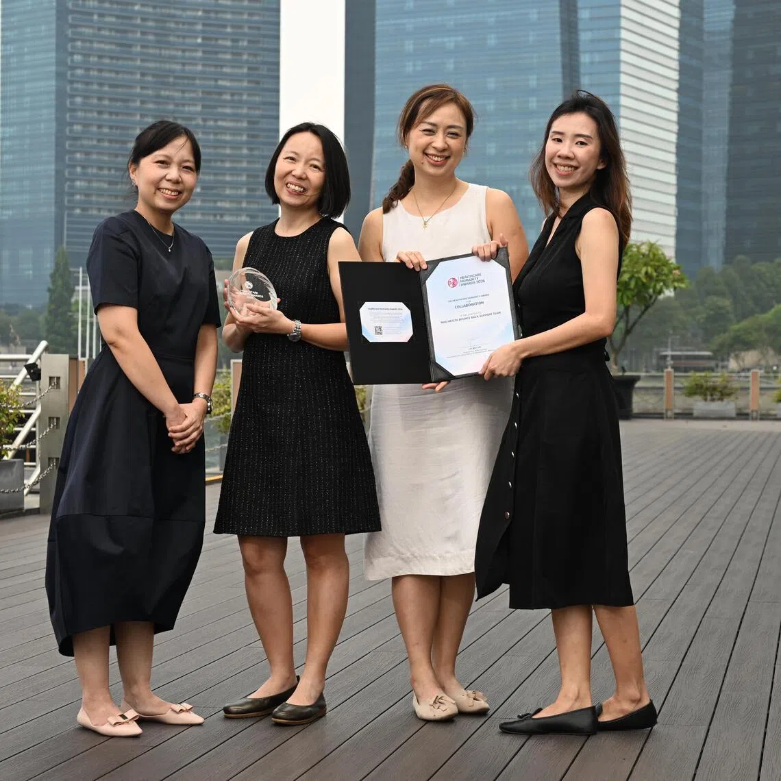 Healthcare Humanity Award winners (from left) Yvette Choo, senior occupational therapist from Khoo Teck Puat Hospital and Yishun Community Hospital; Heidi Tan, senior principal occupational therapist at Tan Tock Seng Hospital; Tess Hng, TTSH principal medical social worker; and Chella Sim, senior medical social worker with KTPH and YCH.