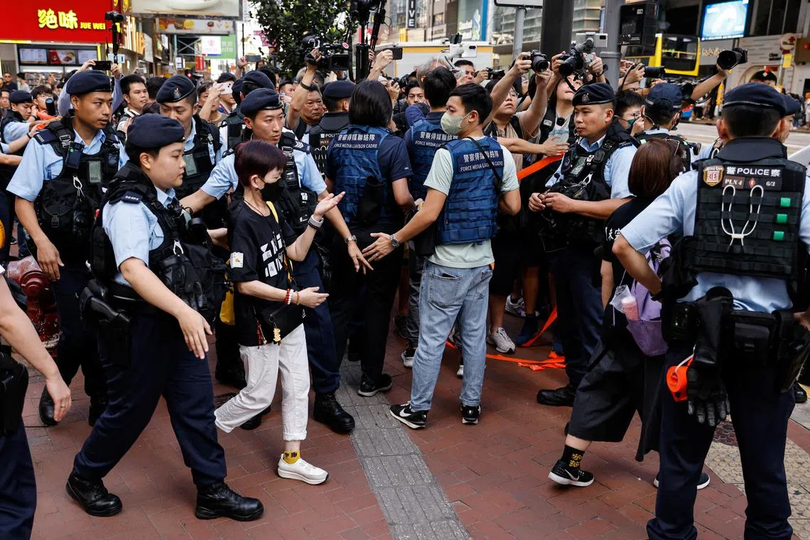 Police search and detain a person on the 34th anniversary of the Tiananmen crackdown, in Hong Kong, on June 4.