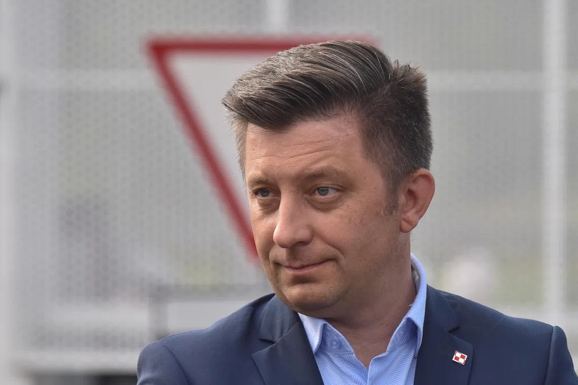FILE PHOTO: Michal Dworczyk, the Chief of the Chancellery of the Prime Minister Office of Poland, visits the renovated Ukraine-Poland border crossing point near the village of Krakovets, as Russia's attack on Ukraine continues, in Lviv region, Ukraine August 16, 2022. REUTERS/Pavlo Palamarchuk/File Photo
