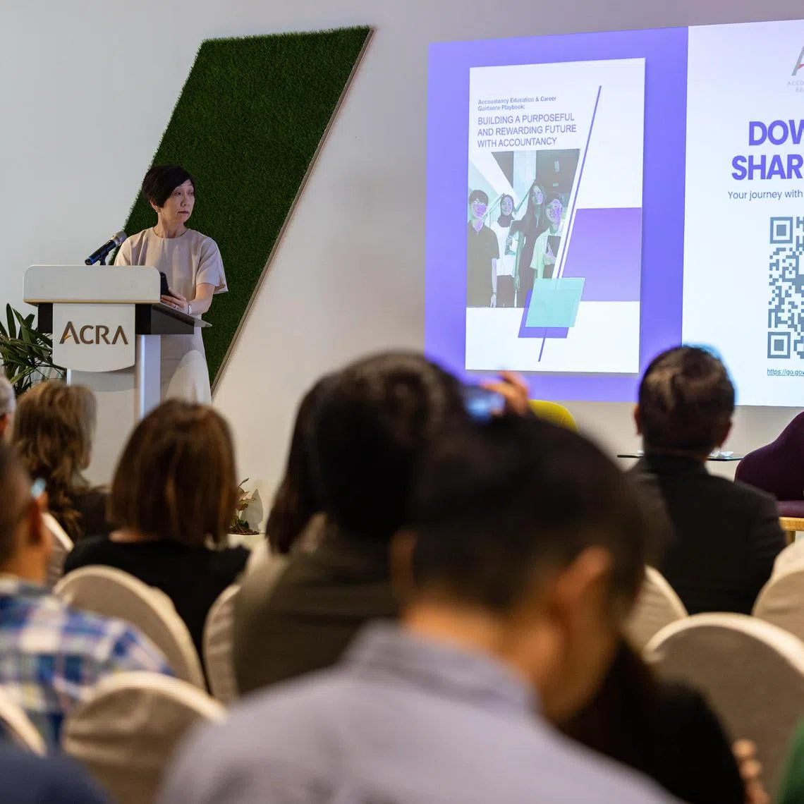ST20250527_202529200628/raacra27/Brian Teo/Rosalind Ang SW/Mrs Chia-Tern Huey Min, Accounting and Corporate Regulatory Authority chief executive, unveiling Singapore’s first Accountancy Education & Career Guidance Playbook at the “Bridging Classrooms and Careers: Shaping the Future of Accountancy” event held at the Accounting and Corporate Regulatory Authority office in Revenue House on May 27, 2025. The Playbook is a comprehensive guide aimed at inspiring students to pursue accountancy as a rewarding, dynamic career, and tackling challenges in talent attraction and development within the sector.ST PHOTO: BRIAN TEO