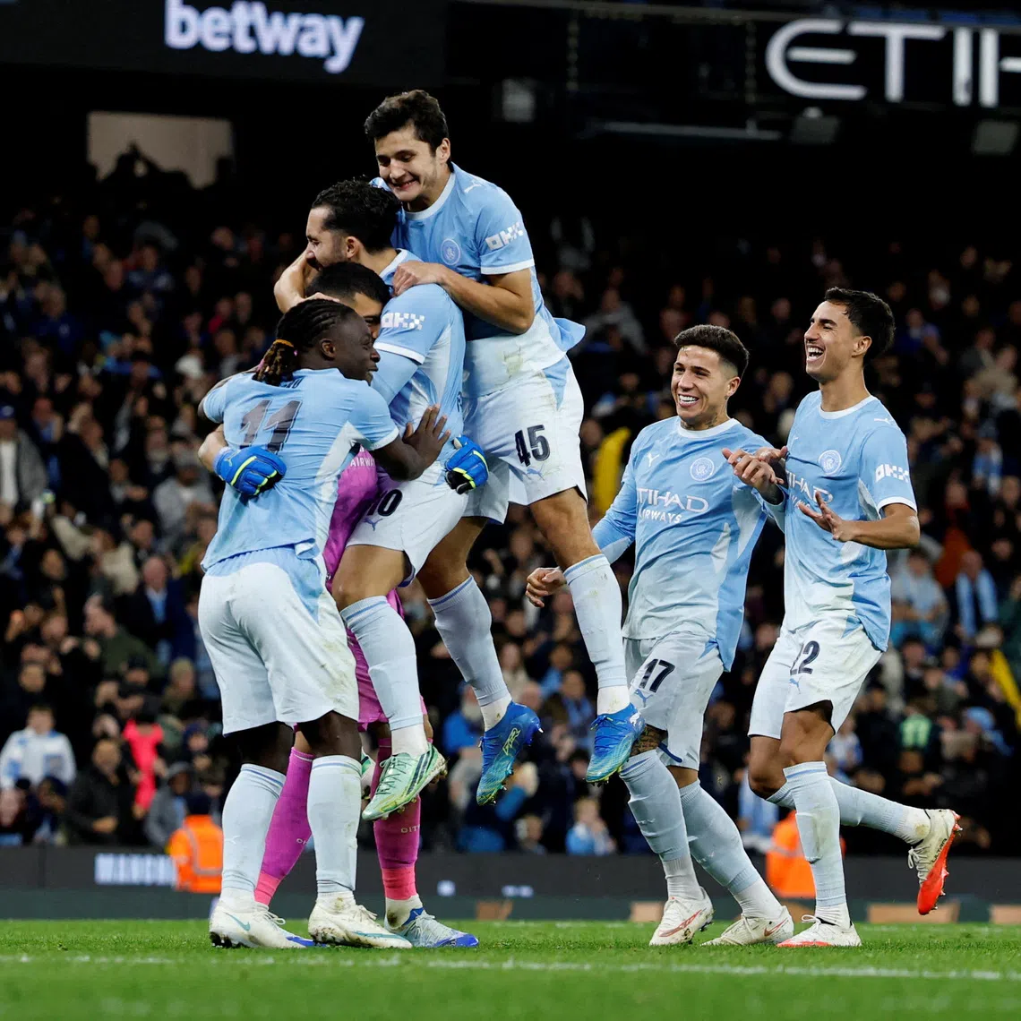 Manchester City goalkeeper Geronimo Rulli made two penalty saves as the League Cup holders won 4-3.