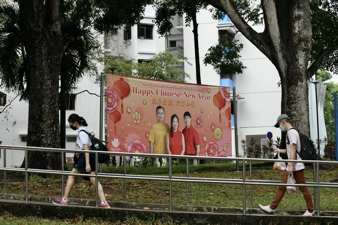 A 2022 photo of a banner in Sengkang featuring Workers’ Party MPs (from left) Louis Chua, He Ting Ru and Jamus Lim. Sengkang GRC is among nine constituencies that will not have their boundaries redrawn.