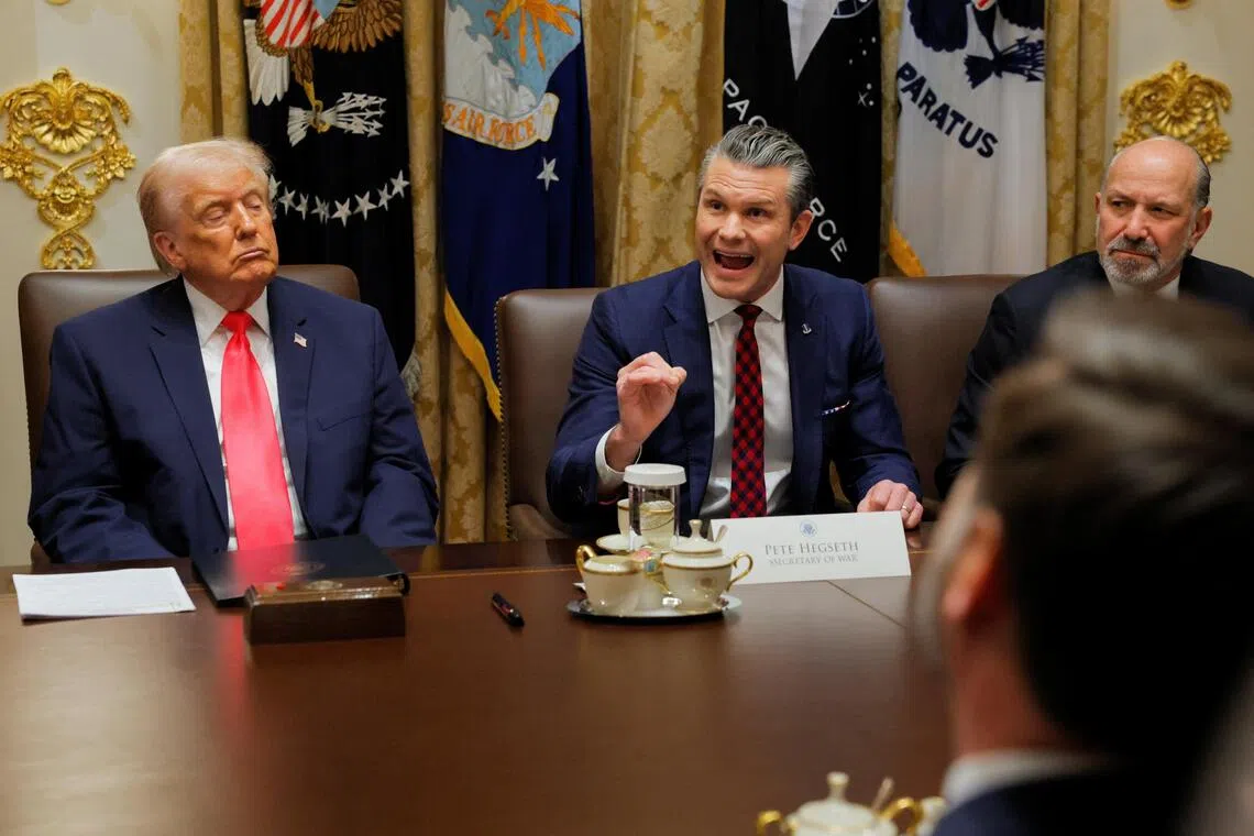 US Secretary of Defence Pete Hegseth speaking during a Cabinet meeting with US President Donald Trump (left), at the White House on Dec 2.