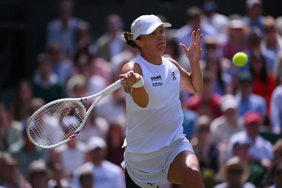 Tennis - Wimbledon - All England Lawn Tennis and Croquet Club, London, Britain - July 2, 2026 Poland's Iga Swiatek in action during her second round match against Czech Republic's Karolina Pliskova REUTERS/Jaimi Joy