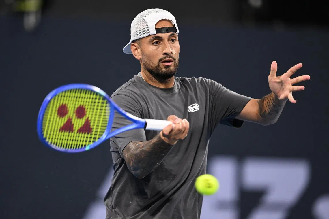 Tennis - Brisbane International Tennis Tournament - Queensland Tennis Centre, Brisbane, Australia - January 4, 2026 Australia's Nick Kyrgios in action during his men's doubles round of 32 match with Australia's Thanasi Kokkinakis against Australia's Matthew Ebden and Rajeev Ram of the U.S. ZAIN MOHAMMED/AAP Image via REUTERS